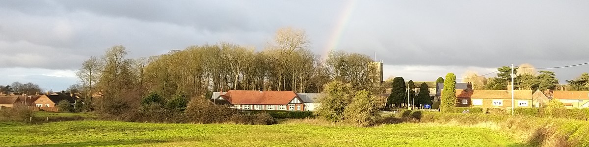 header image of a rainbow over the building
